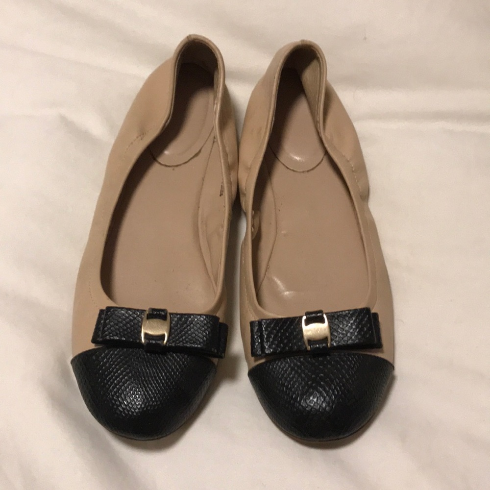 Black snake skin tipped flats